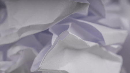 crumpled paper on white table brainstorming in the office concept