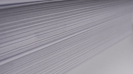 Stacks of white plain paper. white backgroundの写真素材