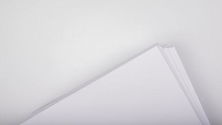 Stacks of white plain paper. white backgroundの写真素材