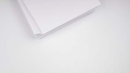 Stacks of white plain paper. white backgroundの写真素材