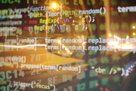 City street with binary code numbers on motion blurred asphalt road , speed and faster digital matrix technology information concept .の写真素材