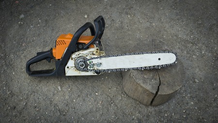 gasoline chain saw. repair of hand tools. woodworking. carpentry business. technical supportの写真素材