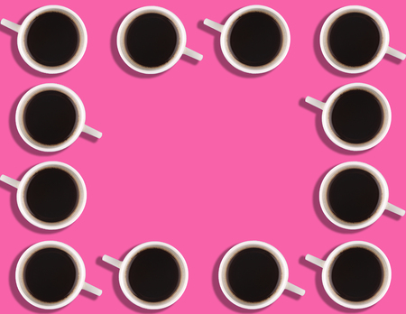 A pattern of small coffee cups on a bright colored background with copyspace.の写真素材