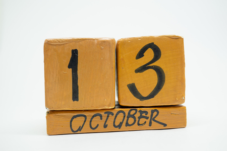 october 13th. Day 13 of month, handmade wood cube calendar isolated on white background. autumn month, day of the year concept.の写真素材