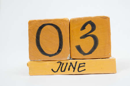 june 3rd. Day 3 of month, handmade wood cube calendar isolated on white background. summer month, day of the year concept.の写真素材