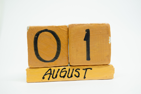 august 1st. Day 1 of month, handmade wood calendar isolated on white background. summer month, day of the year concept.の写真素材
