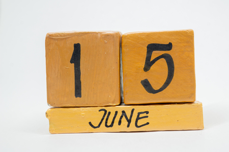 june 15th. Day 15 of month, handmade wood cube calendar on white background. summer month, day of the year concept.の写真素材