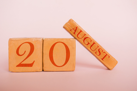 august 20th. Day 20 of month, handmade wood cube calendar  on modern color background. summer month, day of the year concept.の写真素材