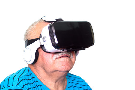 technology, augmented reality, gaming, entertainment and people concept - senior man in virtual...