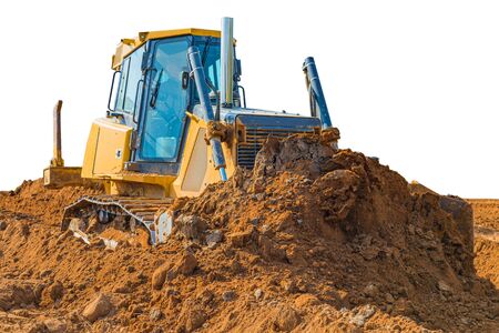 Crawler bulldozer - excavator with clipping path isolated on white background. work on construction site or sand pit.の写真素材