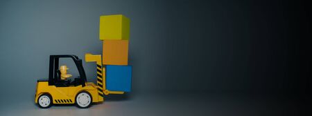 Yellow forklift toy load color cubes. Toys for children. Small forklift loader and three cubesの写真素材