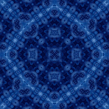 Classic Blue kaleidoscope geometrical ornament abstract background. Trendy color concept of the year. 2020 trend.の写真素材