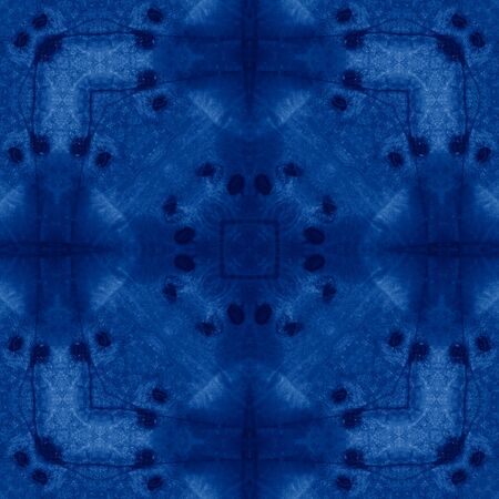 Classic Blue kaleidoscope geometrical ornament abstract background. Trendy color concept of the year. 2020 trend.の写真素材
