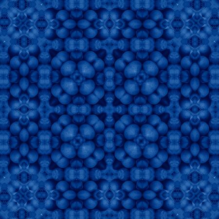 Classic Blue kaleidoscope geometrical ornament abstract background. Trendy color concept of the year. 2020 trend.の写真素材
