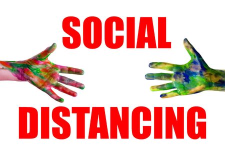 Social distancing and contact-less greetings. Two hands reaching to touch one another. Public health concept.の写真素材