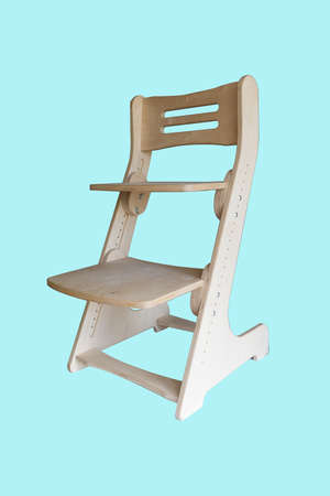 Wooden growing adjustable chair for a childrenの写真素材