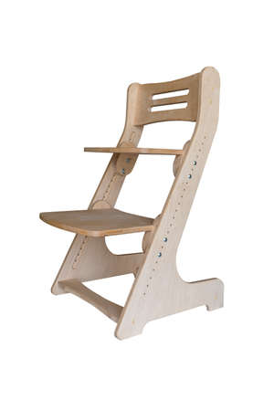 Wooden growing adjustable chair for a children isolated on whiteの写真素材