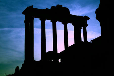 Roman Forum Ruins in Italy.It is photographed against the sun in the evening.の写真素材