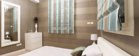 Bedroom with furnishings in a new house.の写真素材