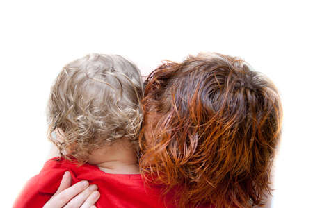 Portrait of mother and son huggingの写真素材