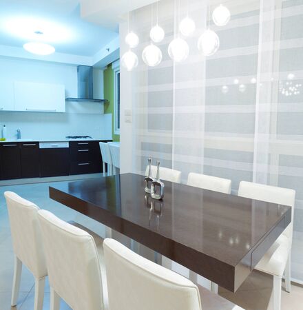 Living room with kitchen in a new house.の写真素材