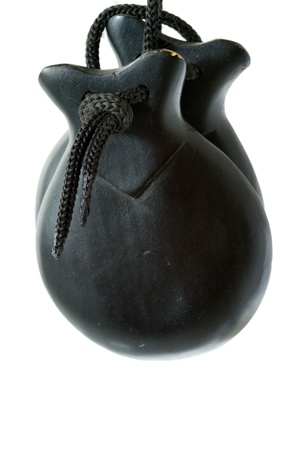 Black castanets on white backgroundの写真素材