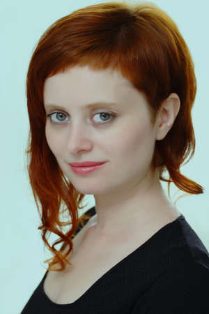 Portrait of a beautiful red-haired girlの写真素材