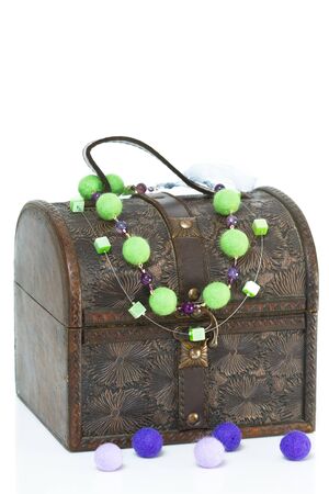 Antique old wooden jewelry box with necklaceの写真素材