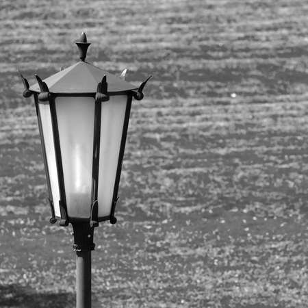 Street lamp on the grass backgroundの写真素材