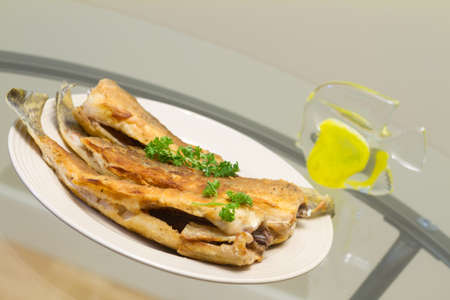 Fried fish pike perch with dillの写真素材