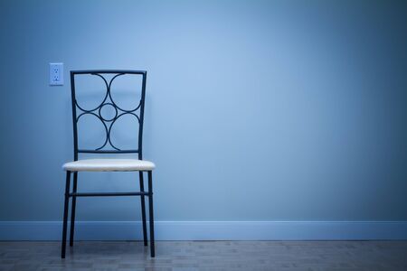 Chair against wall in a new apartmentの写真素材