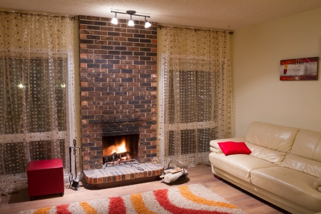 Interior design of living room in a new house with fireplaceの写真素材