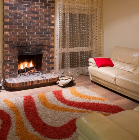 Interior design of living room in a new house with fireplaceの写真素材