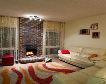 Interior design of living room in a new house with fireplaceの写真素材