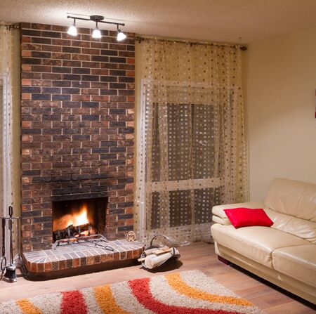 Interior design of living room in a new house with fireplaceの写真素材