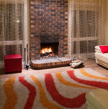 Interior design of living room in a new house with fireplaceの写真素材