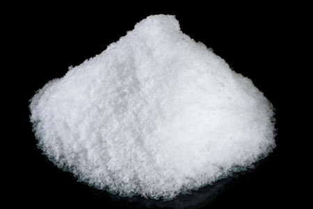 White snow on black background in stidioの写真素材
