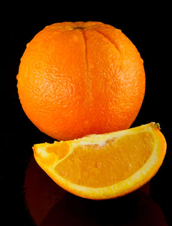Orange Fruit in black backgroundの写真素材