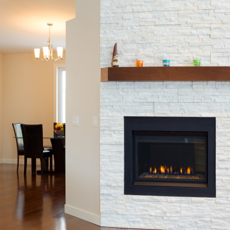 Interior design of modern Living room with fireplace in a new houseの写真素材