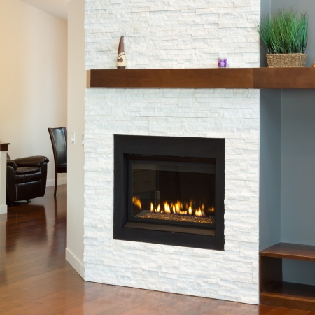 Interior design of modern Living room with fireplace in a new houseの写真素材