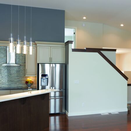 Interior kitchen design with fireplace in a new houseの写真素材