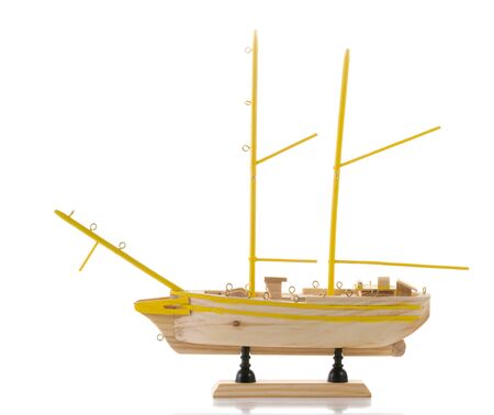 Unfinished model of ship without sails isolated on whiteの写真素材