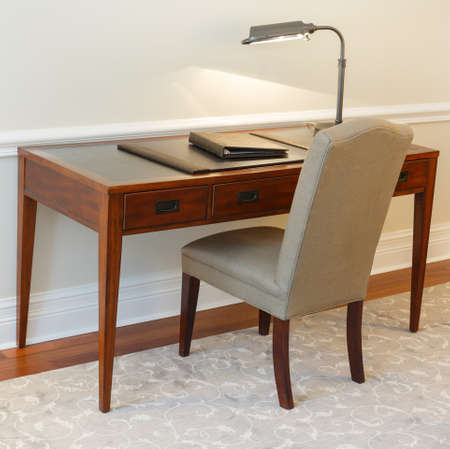 Vintage table with chair in the hotel roomの写真素材