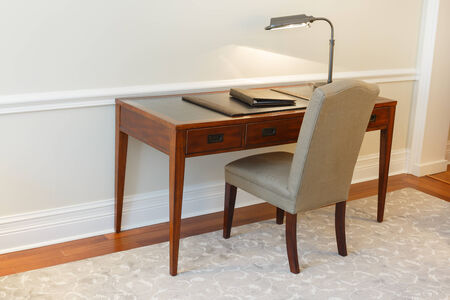 Vintage table with chair in the hotel roomの写真素材