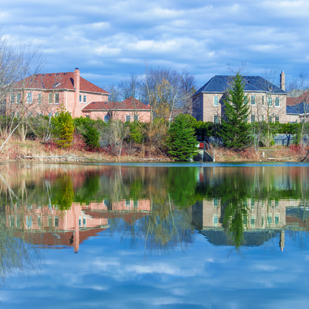 Country houses on rhe pond in Canadaの写真素材