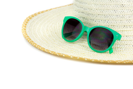 Large beach hat and green sun glassesの写真素材