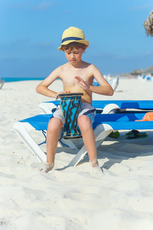 Boy playing on darbukaの写真素材
