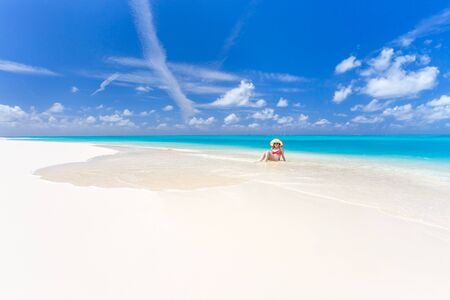 Young woman on the beachの写真素材