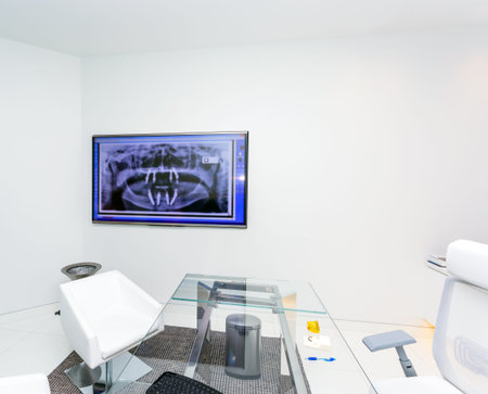 A Modern Dental Office with fluorography on tv screen