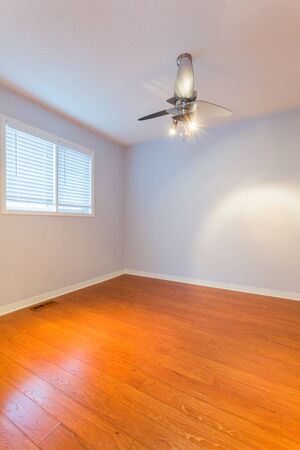 Empty Master Bedroom after renovation in a New Townhouseの写真素材